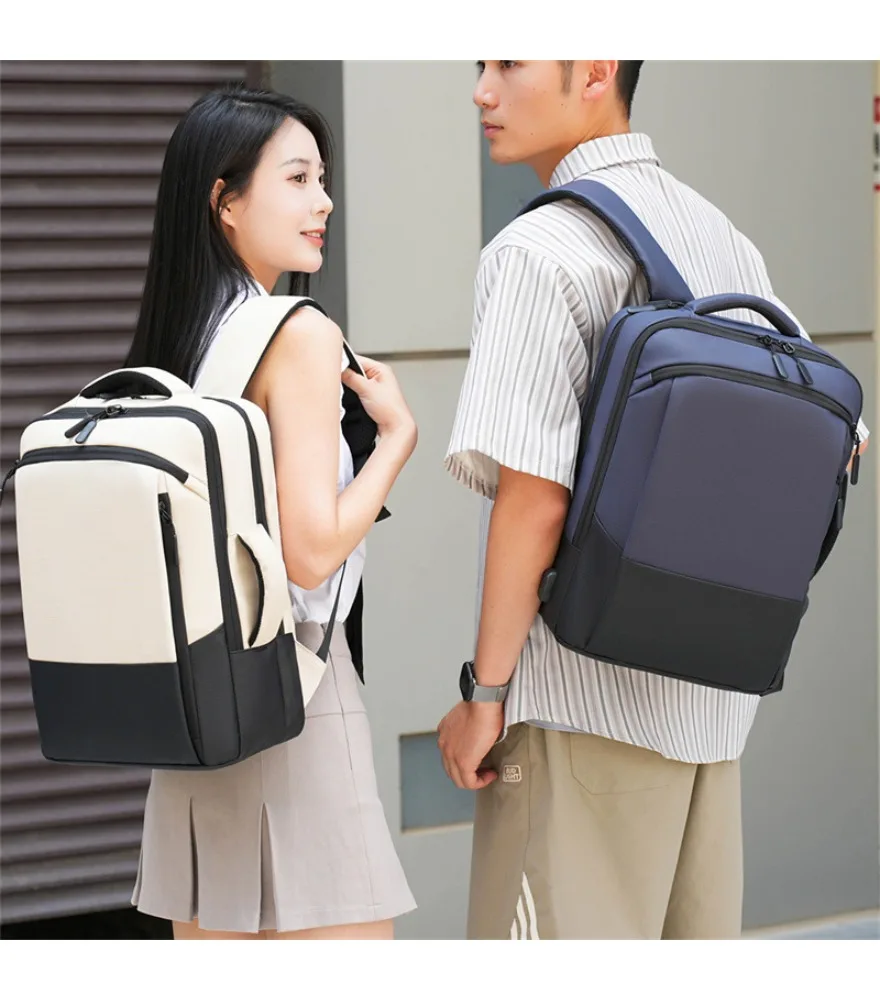 Solid black spliced surface large capacity backpack multi side vertical zippered pockets adjustable breathable shoulder straps