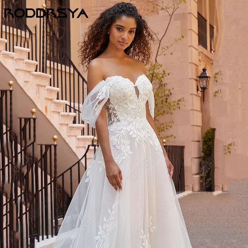 RODDRSYA Vestidos De Casamento De Praia Lace Puff Mangas Vestidos De Noiva Princesa Fora Do Ombro Vestido De Novia Apliques Tulle Sweep Train Praia Vestidos de casamento Lace Puff Mangas Vestidos de noiva Princesa Off