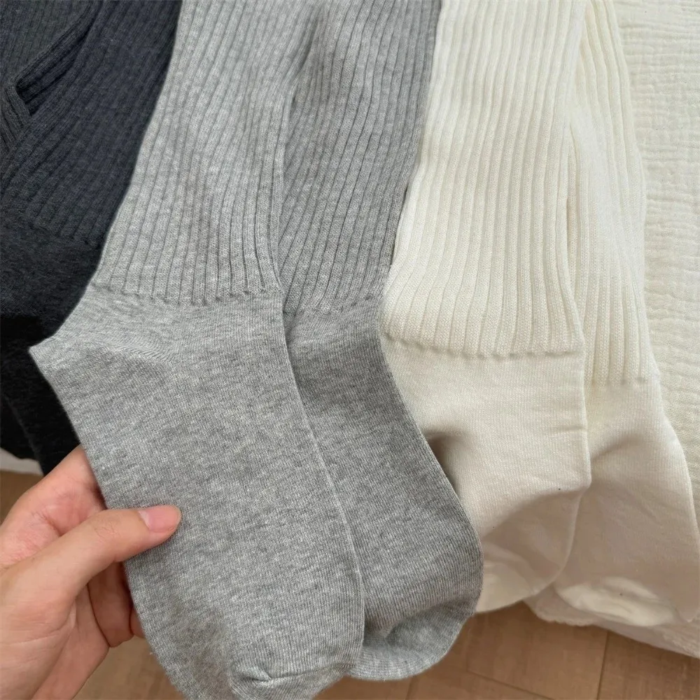 ถุงเท้าผู้หญิงผ้าฝ้ายลำลอง ถุงเท้ายาวถึงเข่า อุ่นสบายสำหรับฤดูใบไม้ร่วงและฤดูหนาว สีพื้น เนื้อนุ่ม ถุงเท้ายาวถึงต้นขา
