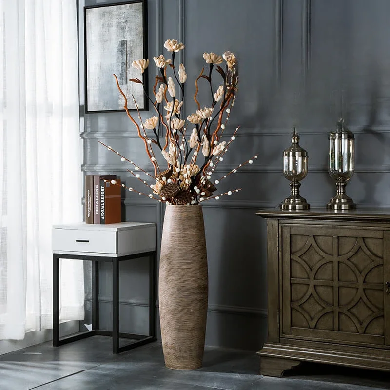 

Floor to ceiling large ceramic vase, living room, TV cabinet next to modern and simple dry flower arrangement, high size decorat