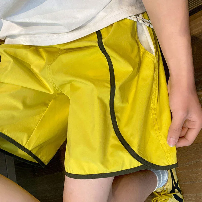 LUZHEN 2025 Estate Stripe Splicing Pantaloncini ad asciugatura rapida Sport Moda uomo Pantaloni casual larghi dritti Vita elastica Nuovo JY2893