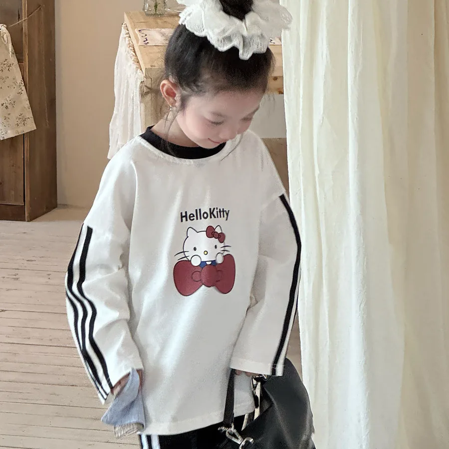أنيمي HelloKitty الفتيات النسخة الكورية الخريف تي شيرت القوس القط مطبوعة بأكمام طويلة تي شيرت الأطفال ثلاثة بار فضفاض رداء علوي غير رسمي