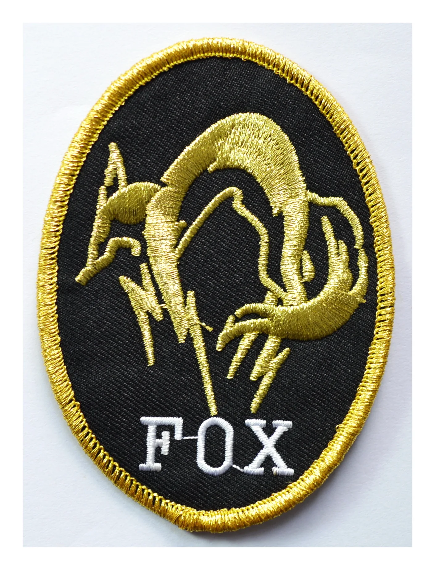 

1x METAL GEAR SOLID FOX HOUND LOGO BADGE COSPLAY BLACK OPS HI VIZ IRON ON PATCH 3.4-2.5 (≈6.5 * 8.8 cm)