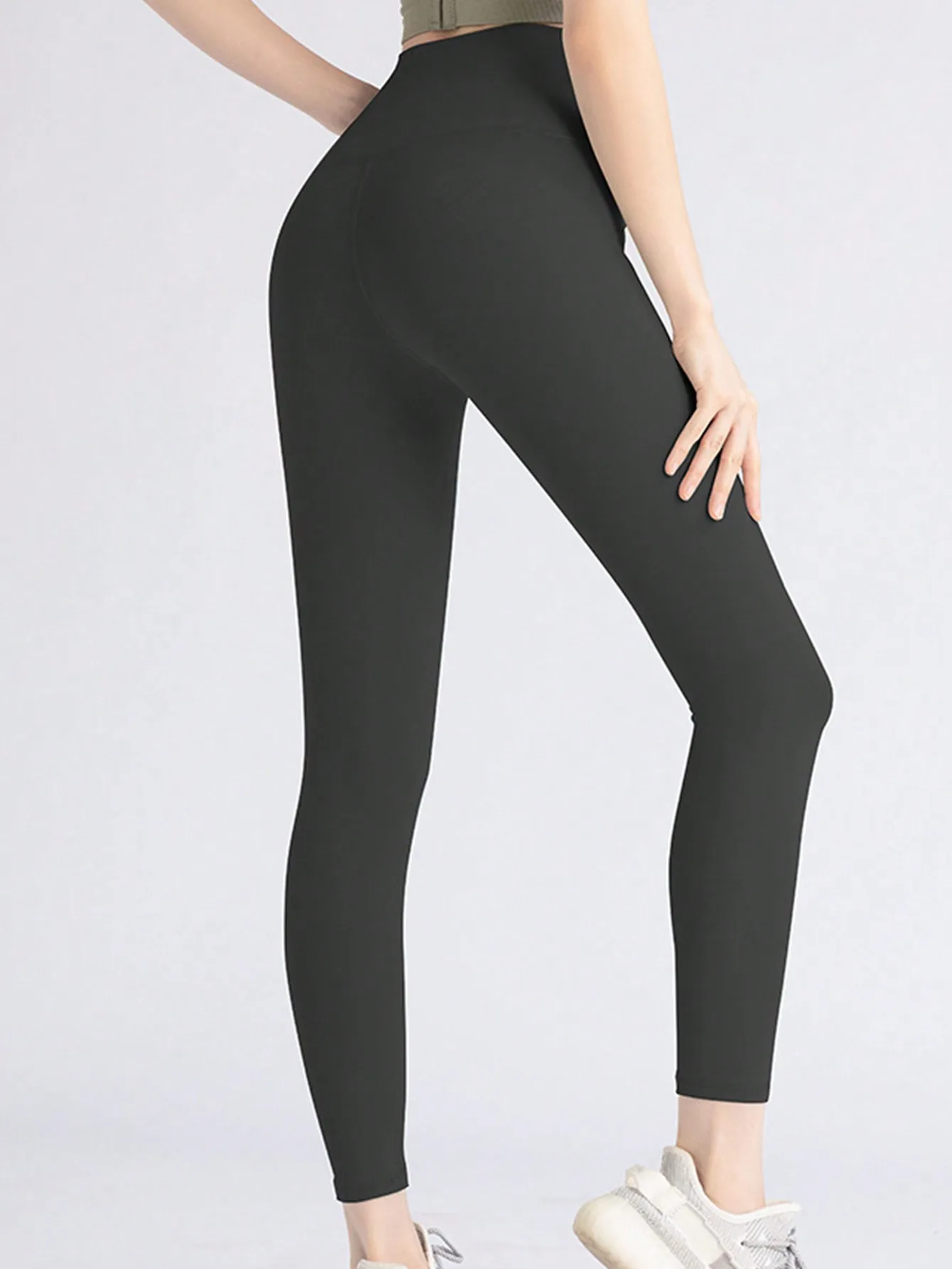 Women's nine-point trousers leggings high-waisted solid color yoga sports pants high-stretch leggings running fitness pants