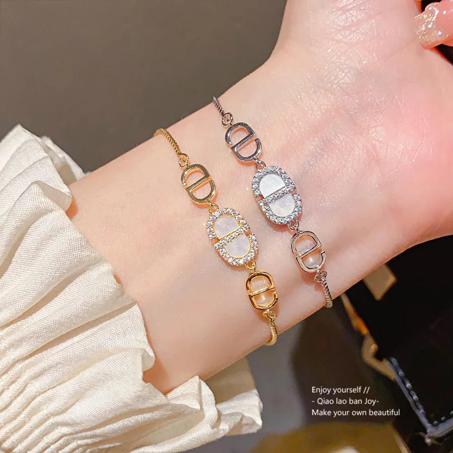 

Тканый легкий браслет 2026, сложные звенья из циркония золотого тона, мастерство семейства, нежная решетка