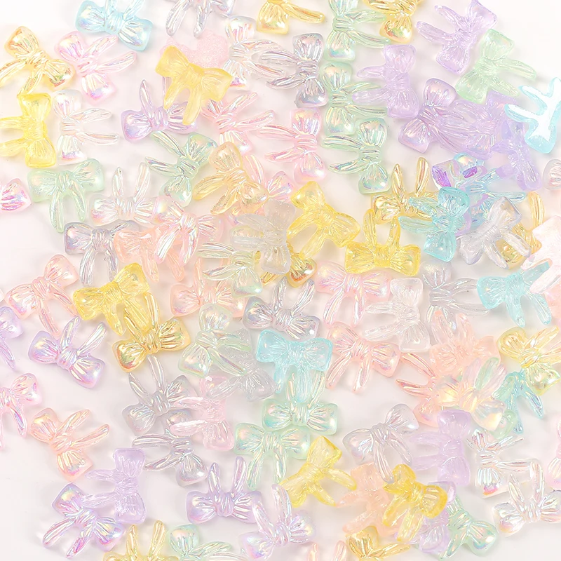 100Pcs Aurora Bow Nail Charms Mixed Color AB Resin Bows Nail Art Charms Long Tail Designs Resin Bow-Knot Nail Rhinestones