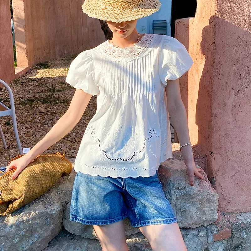 

Новая женская летняя блузка в французском стиле, 100% хлопок, белая, с коротким рукавом, ажурная, с кружевной вышивкой, свободного кроя, повседневная.