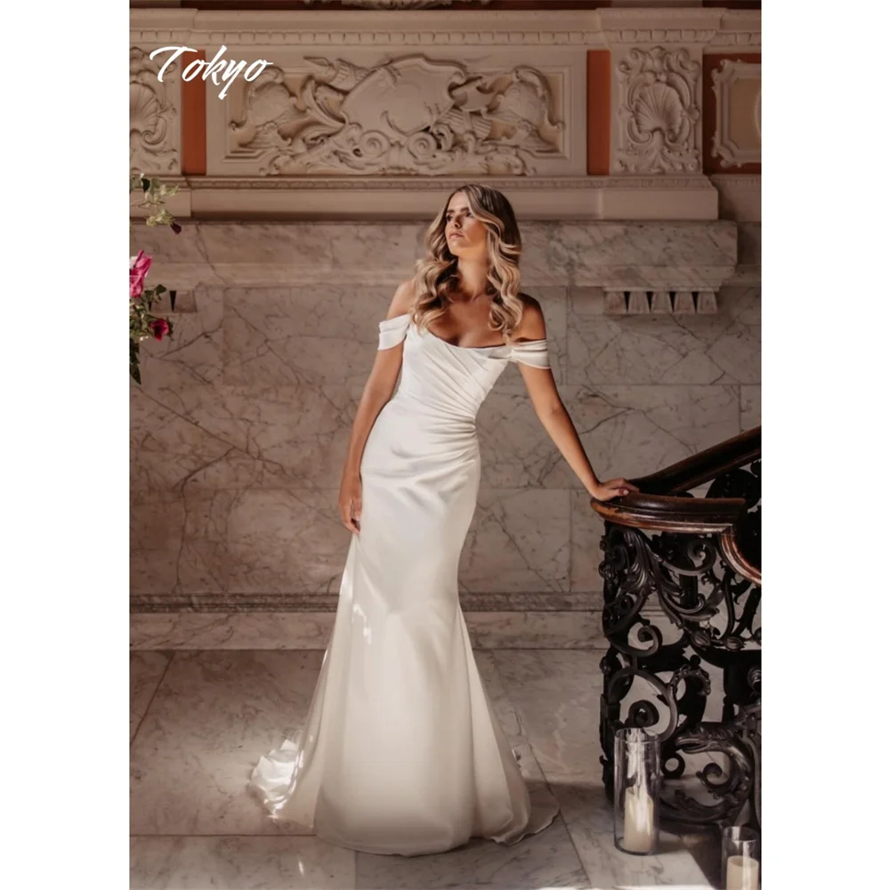 

Tokyo Customized White Off Shoulder Wedding Dresses Sleeveless Elegant Backless Bridal Gown Court Train Mermaid Wedding Gown