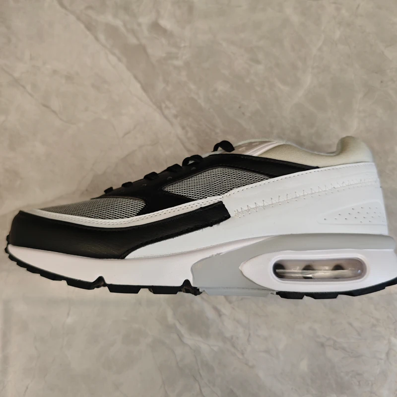 2025 Nuove scarpe da corsa da uomo Sport Grigio Nero Bianco Scarpe da ginnastica da uomo Scarpe da ginnastica da donna