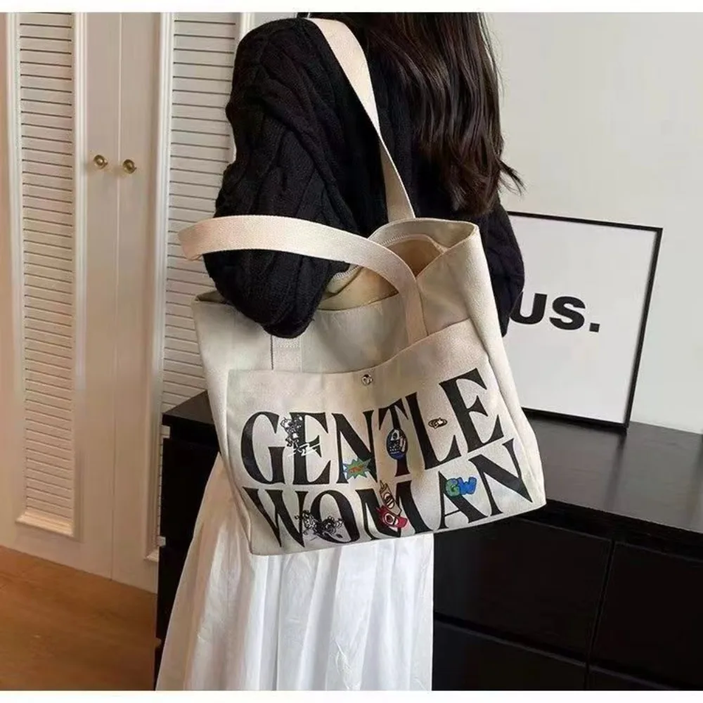 The Canvas Tote Shoulder Bag Has a Large Capacity for Any Outfit for Women and Students.