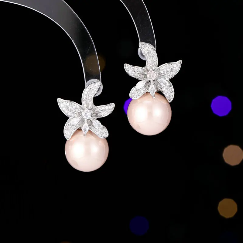 

New s925 silver needle micro-inlaid zircon flower earrings, women's personalized light luxury lily pearl stud earrings