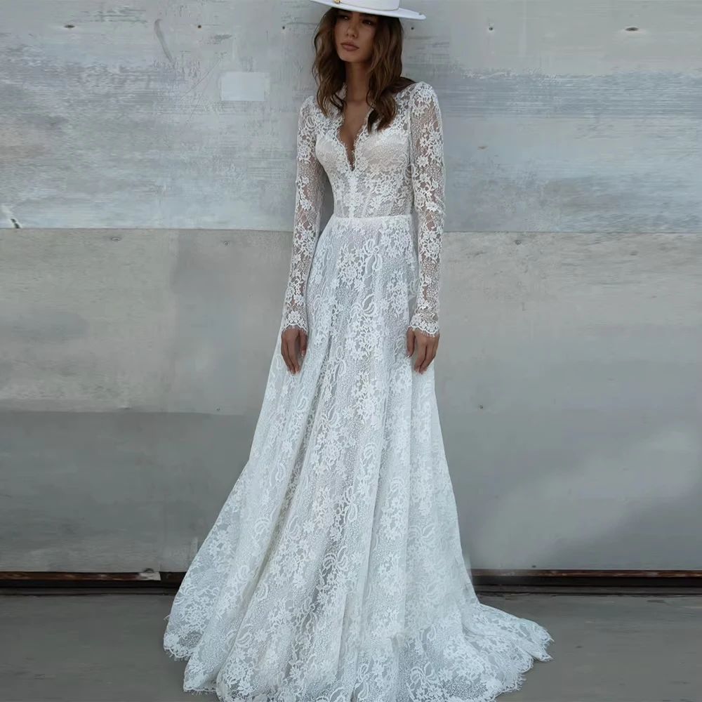 ชุดแต่งงานคอวีแบบหรูหราสั่งตัดได้สำหรับเจ้าสาว แขนยาว ผ้าลูกไม้ทรงเอไลน์ ประดับด้วยลายปัก ชุดเจ้าสาวยาวกรอมพื้น