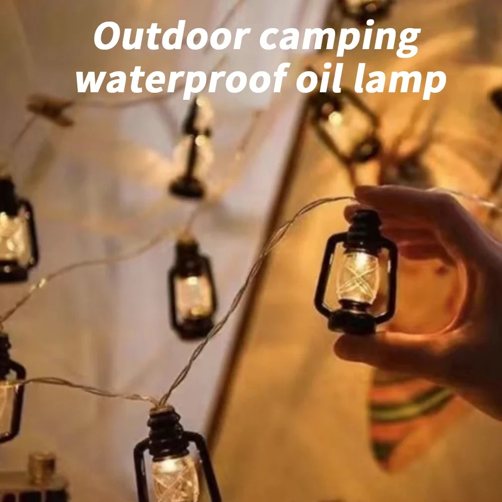 ไฟเชือกเทียนขนาดเล็กใช้พลังงานจากโคมไฟในบ้านน้ำมันก๊าดย้อนยุคขนาดเล็กสำหรับลานบ้านกลางแจ้งปาร์ตี้คริสต์มาสในสวน