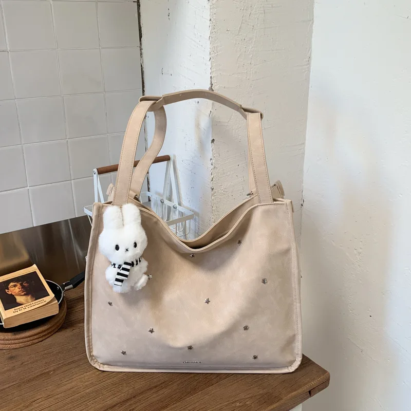

Korean-style commuter backpack for women2026New large-capacity soft-surface handbag with a high-end feel, suitable for shoulder