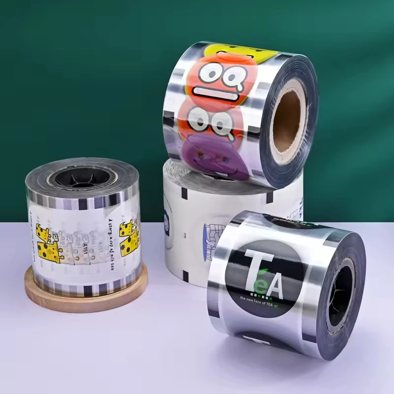 Calibro 90/95 Figura di cartone animato Logo stampato Pellicola sigillante per tazze Tè al latte Tazza di plastica Pellicola sigillante per latte di soia Un rotolo di rilegatura