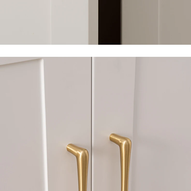 Pair of slim brass handles on white panelled doors