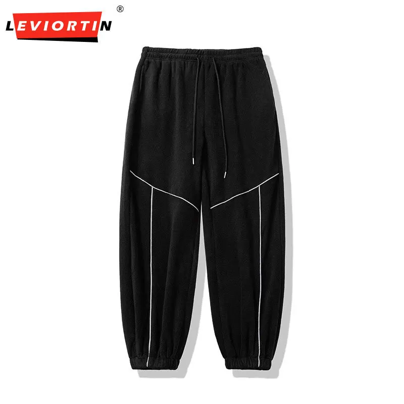 Autumn and winter new trendy high street reflective lines straight tube loose casual versatile fleece sports pants for men