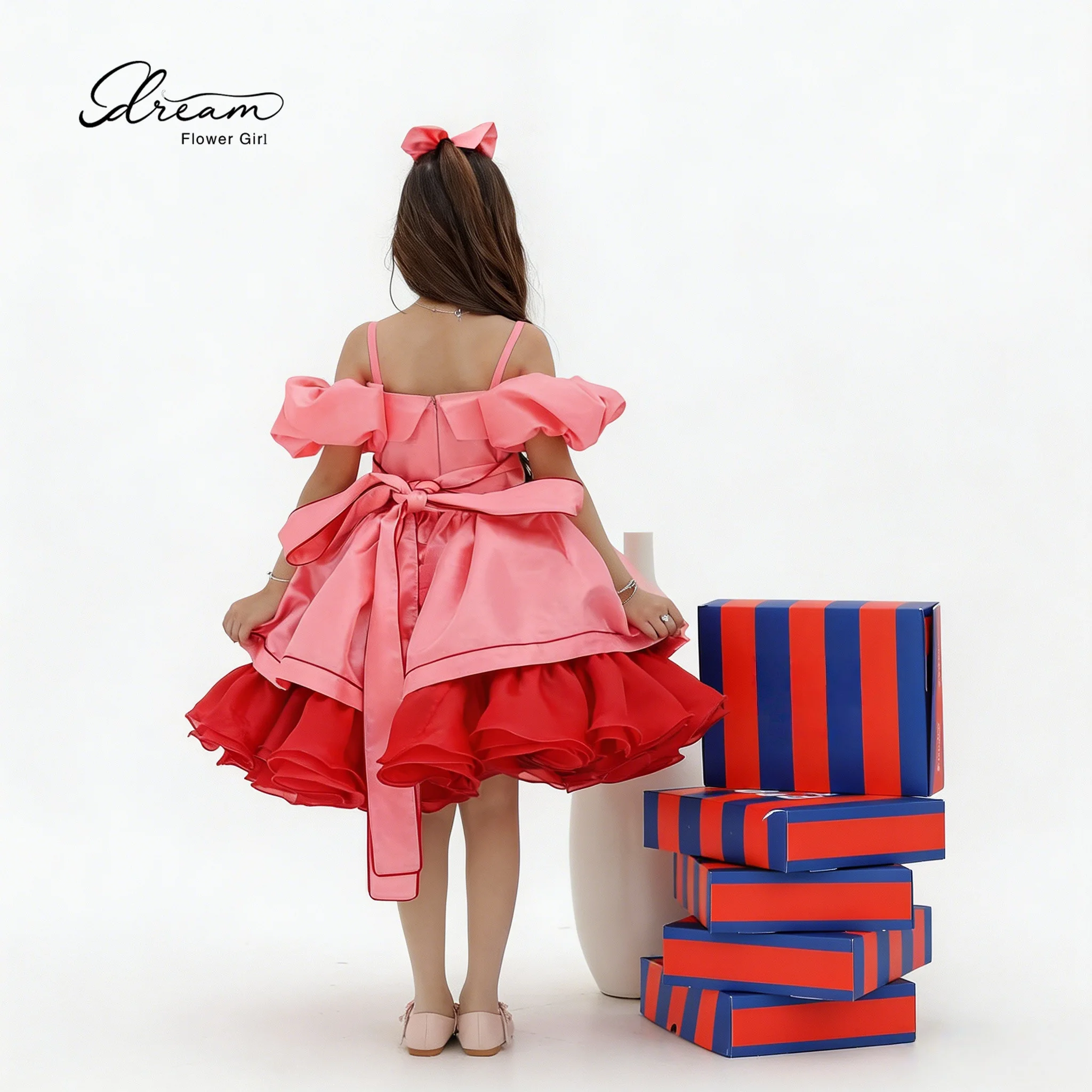 A dignified pink off-the-shoulder short-sleeved floral sleeve knee-length evening dress with a embroidered and fluffy skirt.