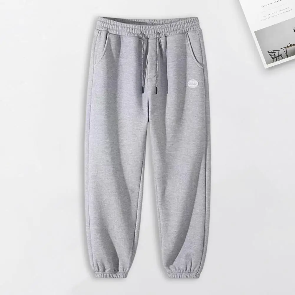 Men's Spring And Fall Pants Side Pocket Pull Rope Elastic Waist Plus Size Casual Pants Solid Color Baggy Street Style Sweatpants