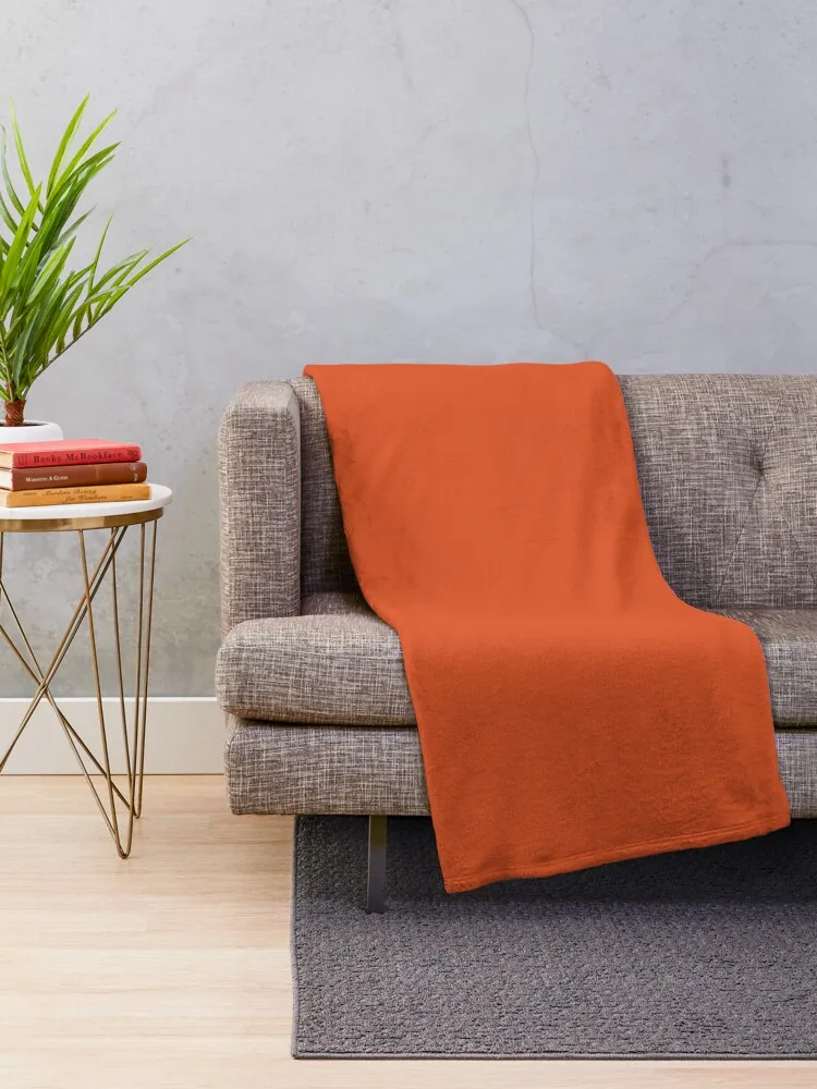 Dark Orange Solid Throw Blanket Plaid on the sofa Designers Blankets