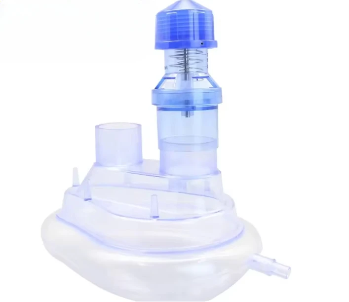 Disposable twin port mask with peep valve