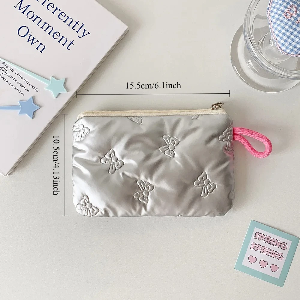 حقيبة مكياج بفيونكة فضية، سماعات رأس محمولة للسفر، حقيبة تخزين كابل البيانات، محفظة