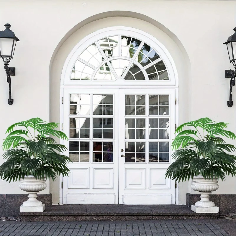 

Реалистичное искусственное зеленое растение с длинными стеблими и большими листьями для внутреннего и наружного декоративного использования.