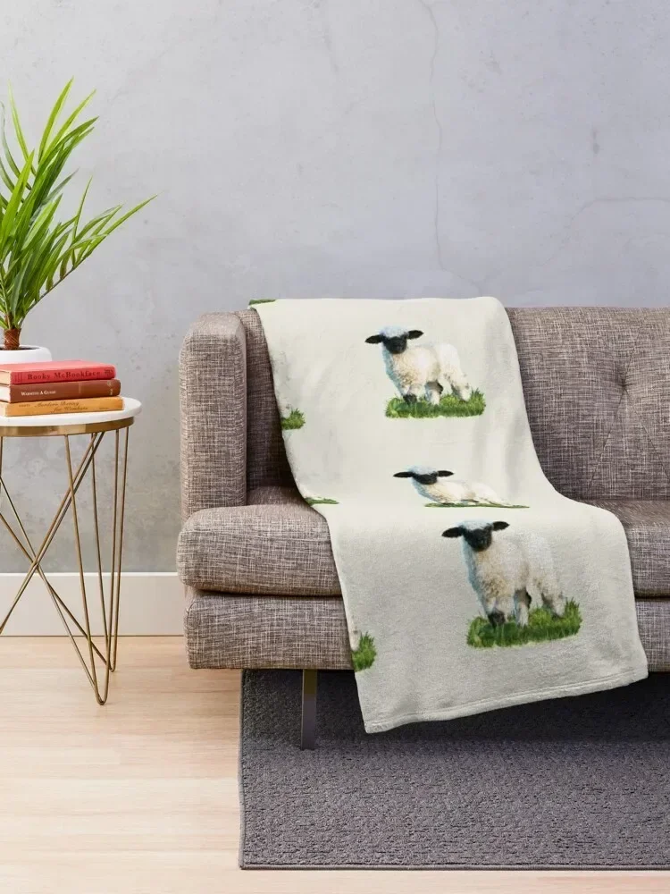 Valais Blacknose Lamb in a Meadow Throw Blanket blankets ands halloween Blankets