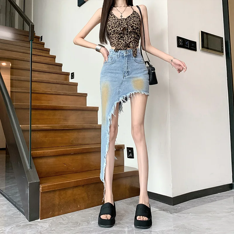 

2024 Summer New Spicy Girl Fashionable Irregular Denim Skirt with Washed Fleece Edge Wrapped Hip Skirt for women