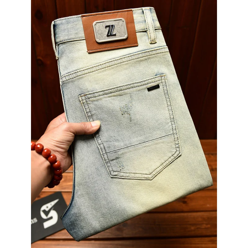 2025 الصيف رقيقة ملابس للرجال العلامة التجارية العصرية التخسيس الساق الصغيرة الجينز الرجال خمر لكمات السراويل