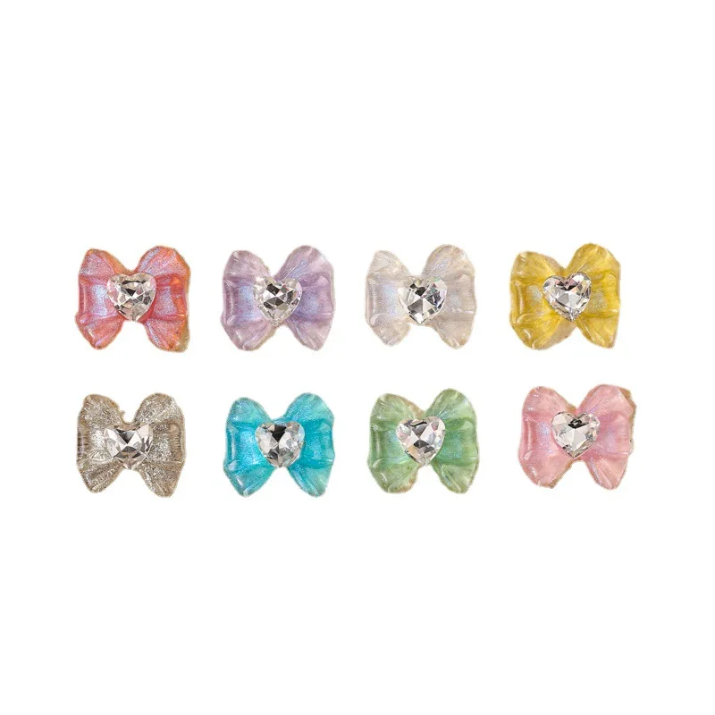 10 pz/lotto Ice Clear Nail Art Bow Charms Con Cuore Strass Gemma di Cristallo Trasparente Glitter Bowknot Unghie Decorazione Accessorio