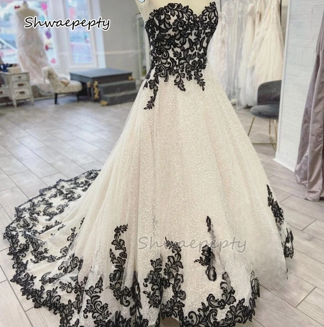 

Sparkly Sequined A-Line Wedding Dress Ivory Black Lace Appliques Long A-Line Bridal Gown Sleeveless Customized