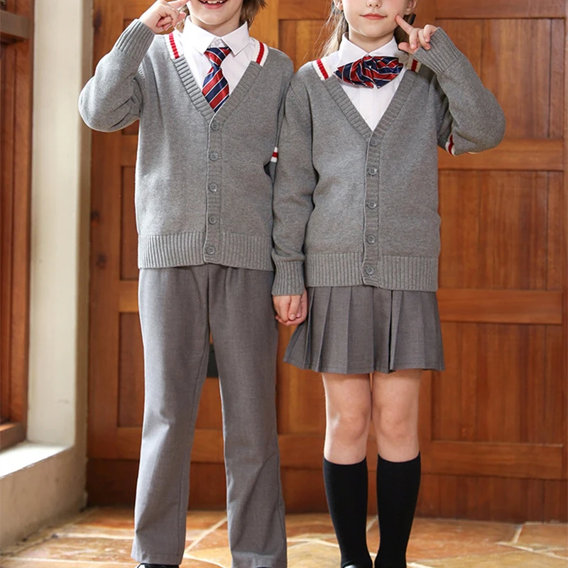 Bambini Autunno Inverno Maglione Uniforme Uniformi della scuola primaria Cappotto lavorato a maglia stile britannico Gonna a pieghe + Cravatta + Camicie JK Suit