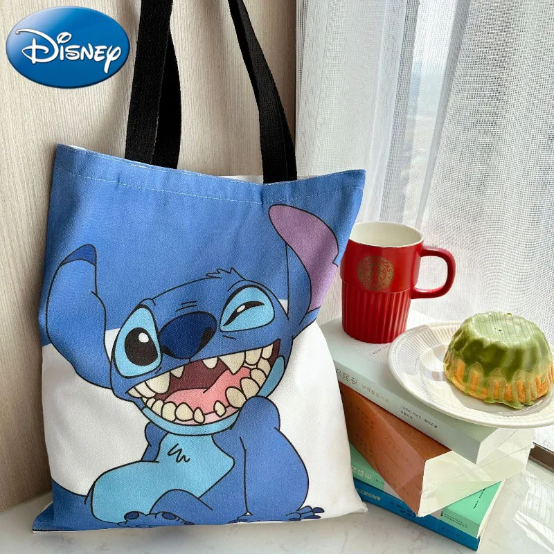 

Fashion and Versatile 2025 Disney New Stitch Canvas Women's Large-capacity Cute Card Student Commuter Shoulder Bag Tutoring Bag