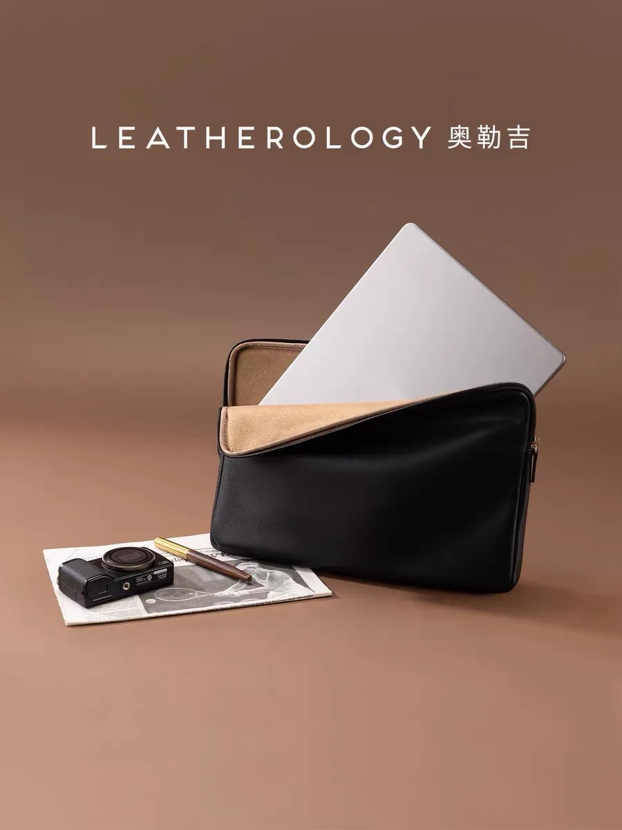 Leather computer bag suitable for MacBook, made of top-grain cowhide material.