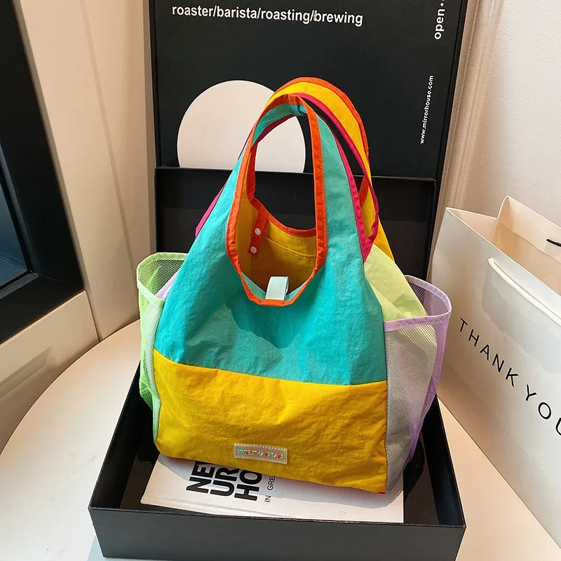 

Color splicing dopamine folding shopping bag bag 2025 new lightweight casual nylon portable shoulder bag