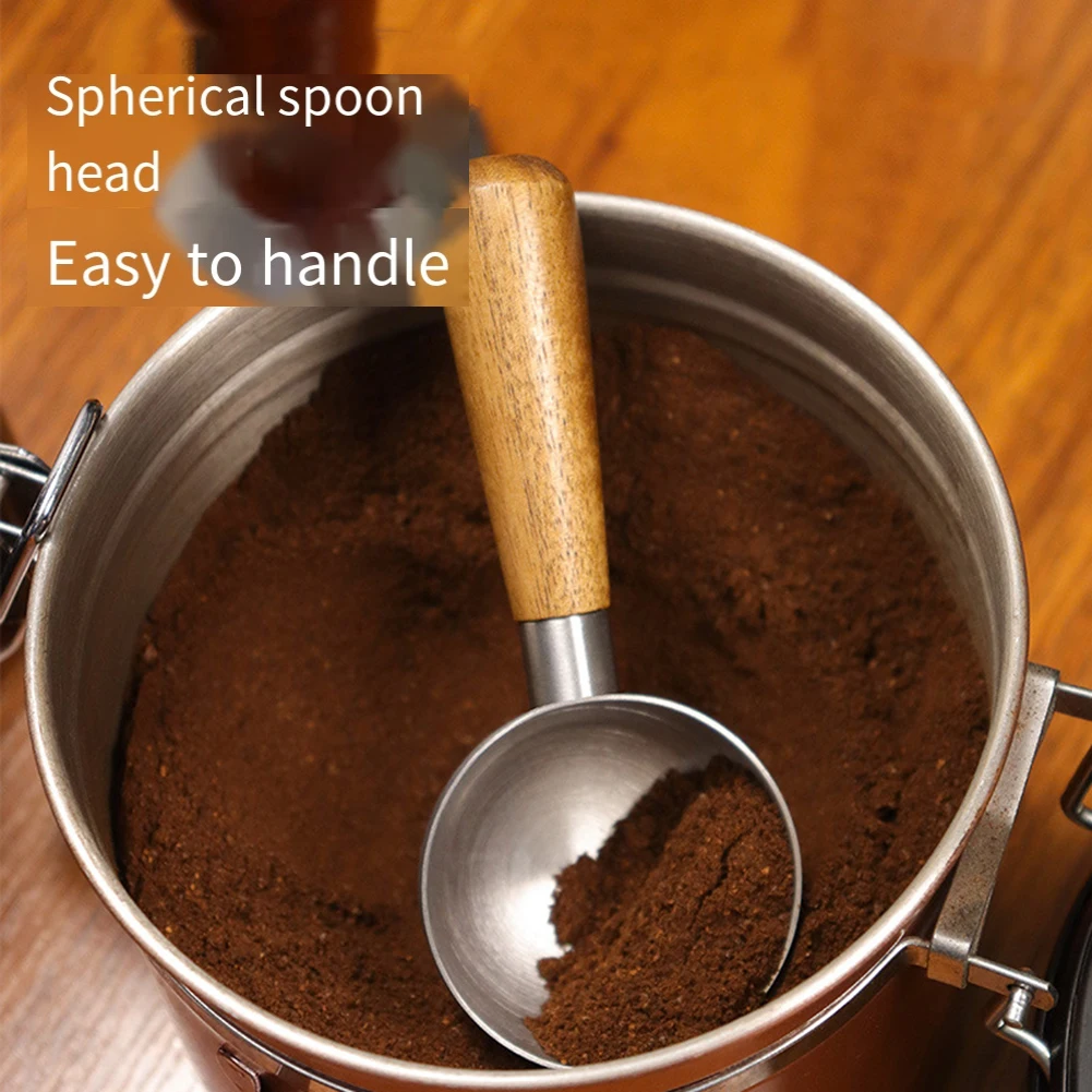 

Изящная мерная ложка из нержавеющей стали с деревянной ручкой, отлично подходит для измерения кофейных зерен и других ингредиентов.