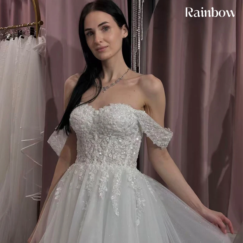 فستان زفاف مكشوف الكتفين من الأورجانزا مع تطريز على شكل حرف a بطول الأرض فستان زفاف مخصص برباط فيستدو دي نوفيا ترتر