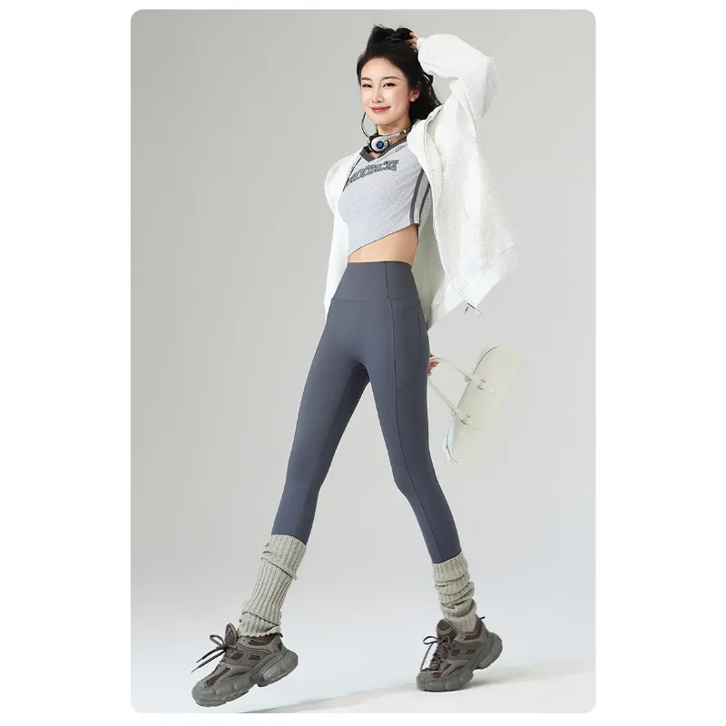 เลกกิ้งผู้หญิงสีพื้นทรงเข้ารูปเอวสูงผ้ากำมะหยี่แฟชั่นสำหรับฤดูใบไม้ร่วงและฤดูหนาว เหมาะสำหรับเล่นกีฬาและวิ่ง