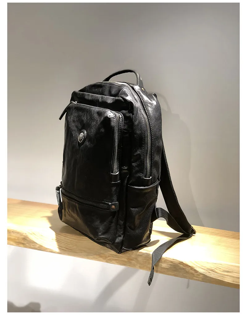 Fashion luxury genuine leather men women's black backpack outdoor travel high quality natural real cowhide work laptop bagpack