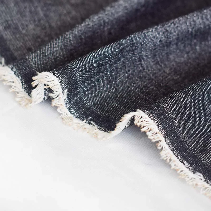 工場卸売在庫価格デニム生地光沢のあるジーンズデニム生地、ジーンズ、ズボン、コート、キャップのヤード単位販売