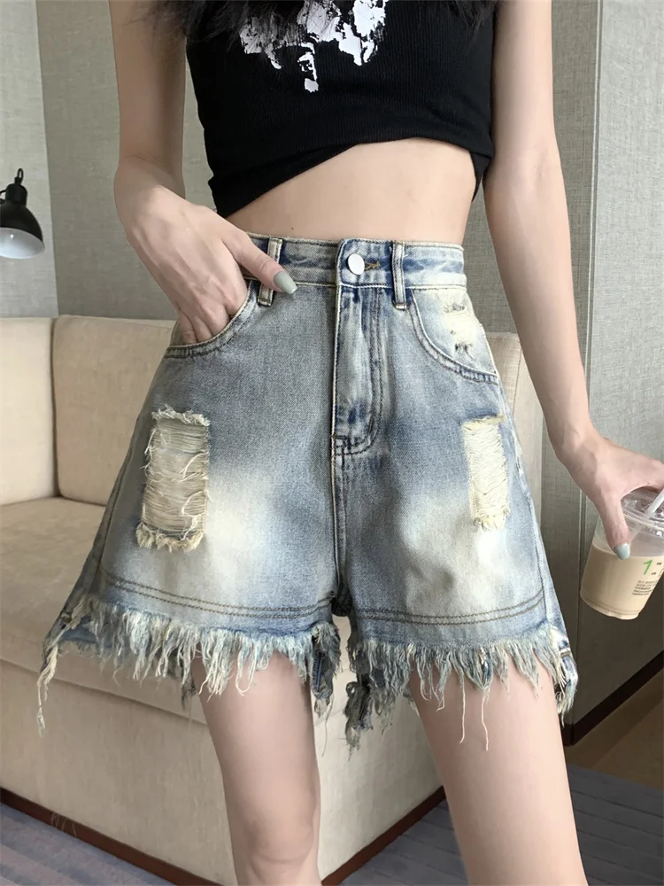 Pantalones vaqueros Retro destridos de cintura alta para mujer, diseño de talla grande con agujero, dobladillo deshilachado, pantalones picantes de cintura alta para primavera y verano