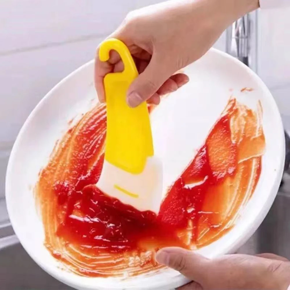 

Kitchen cleaning soft scraper, silicone soft head cleaner, removes oil stains and grease from pot bottoms.
