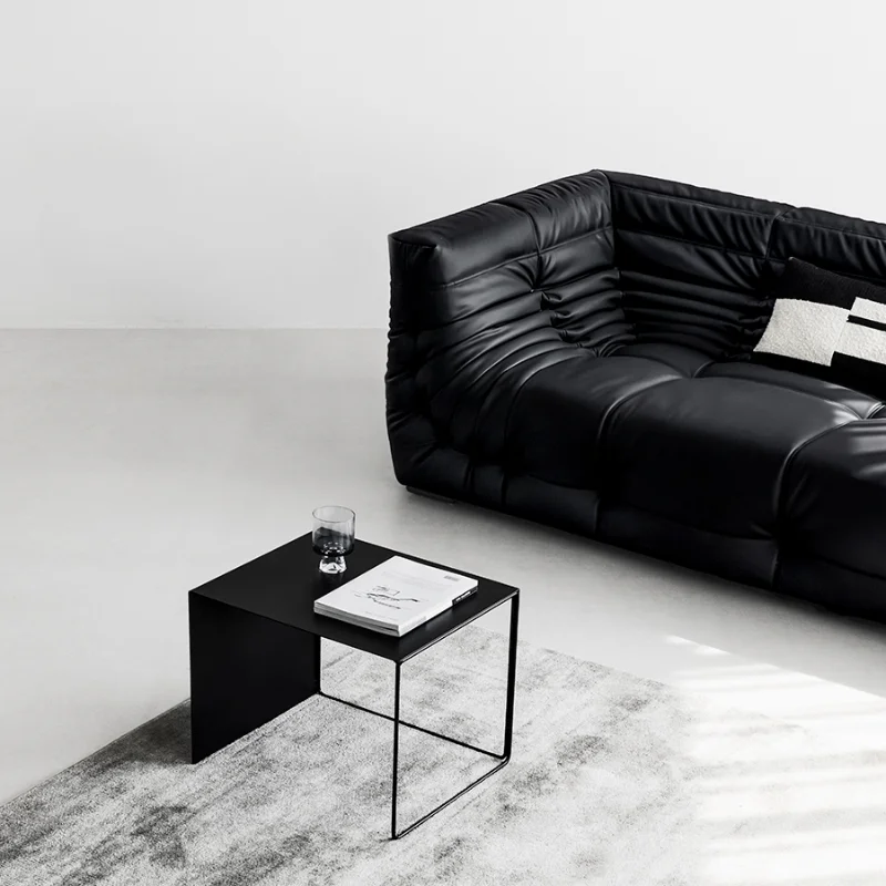 

Caterpillar three-person black leather sofa, retro lazy floor-to-ceiling white straight row double