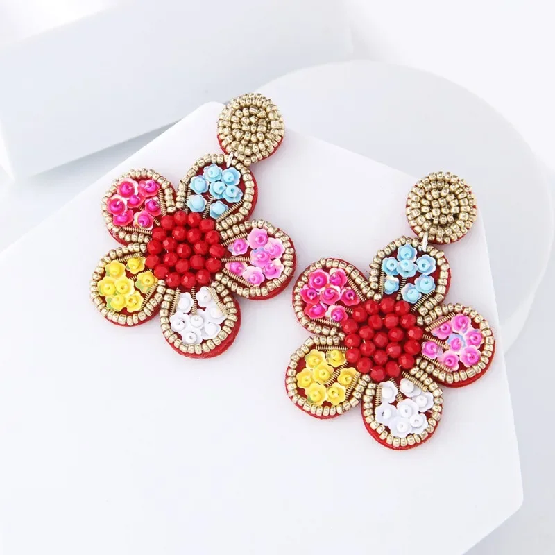 Rice bead earrings Originality Hand weaving Bohemia Alloy Retro Glitter Flower Pattern Tidal current Simplicity Beaded earrings