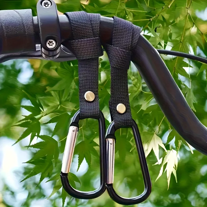 Zwei multifunktionale Zusatzhaken, geeignet zum Aufhängen von Windeln und Taschentüchern, für den Einsatz an Kinderwagen, Fahrrädern und Outdoor-Zelten.