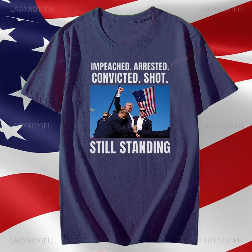 Camiseta Trump Shot Assassination Attempt Still Standing Me Stronger Tshir Camiseta estampada de algodón para hombres y mujeres camisetas gráficas