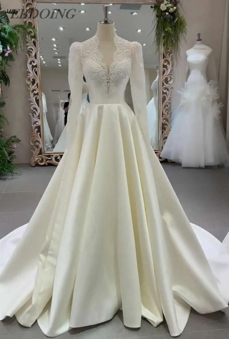 

EBDOING свадебное платье трапециевидной формы с атласным вырезом и длинными рукавами, со шлейфом часовни, с открытой спиной и бисером, индивидуальное платье невесты