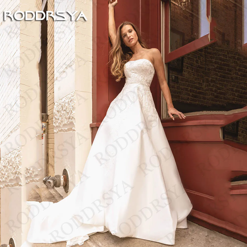 Roddrsya vestido de novia träger loses hochzeits kleid eine linie braut elegante rücken freie applikationen satin spitze brautkleid ärmel los Vestido De Novia 2024 Trägerloses Brautkleid A Line  Braut Elegant Rückenfre