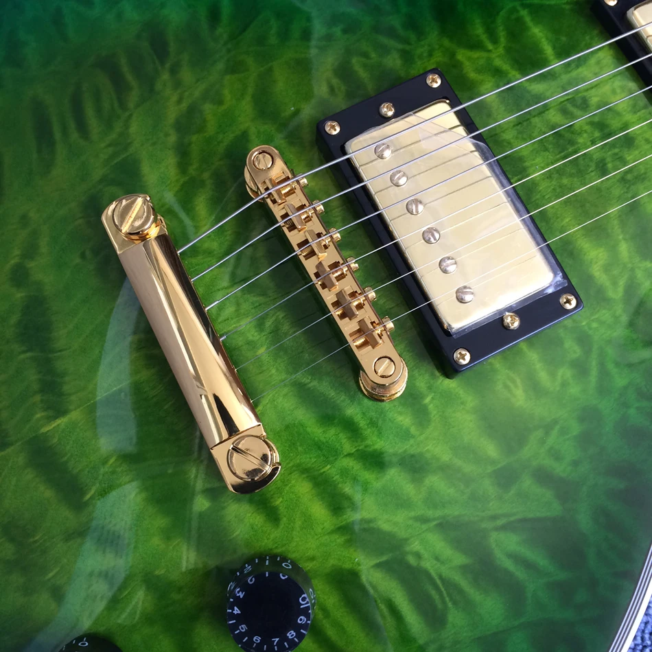 High quality electric guitar, rosewood fingerboard, green maple top